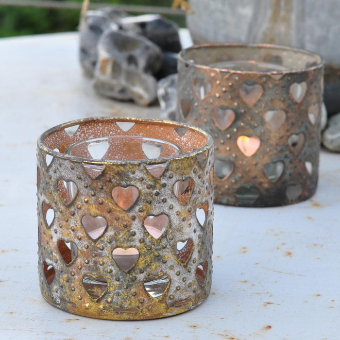 Antique metal votive candle holder