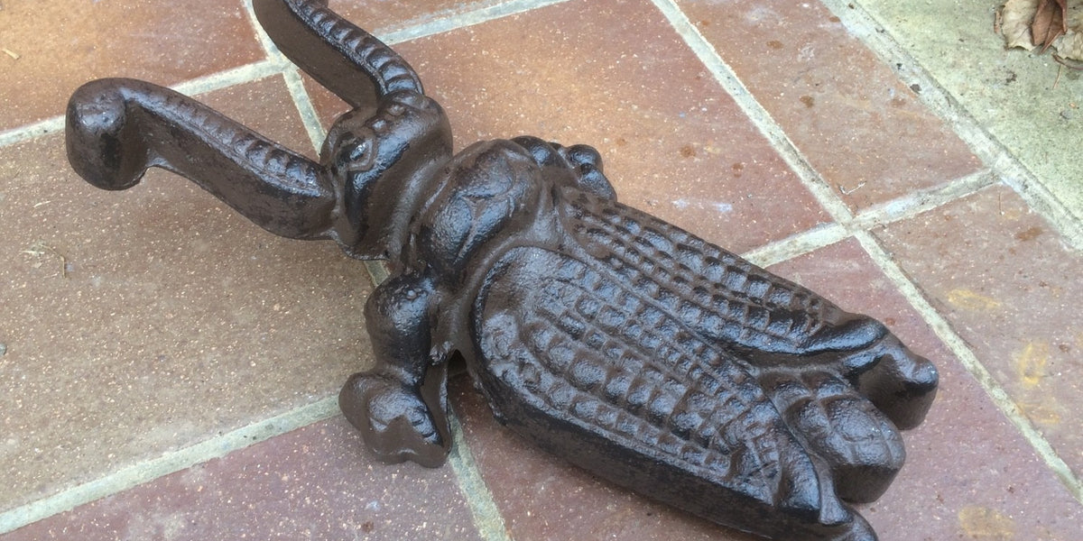 Antique cast iron beetle boot jack sale