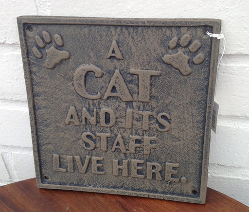 Cast Iron Cat Sign - A CAT AND IT'S STAFF LIVE HERE